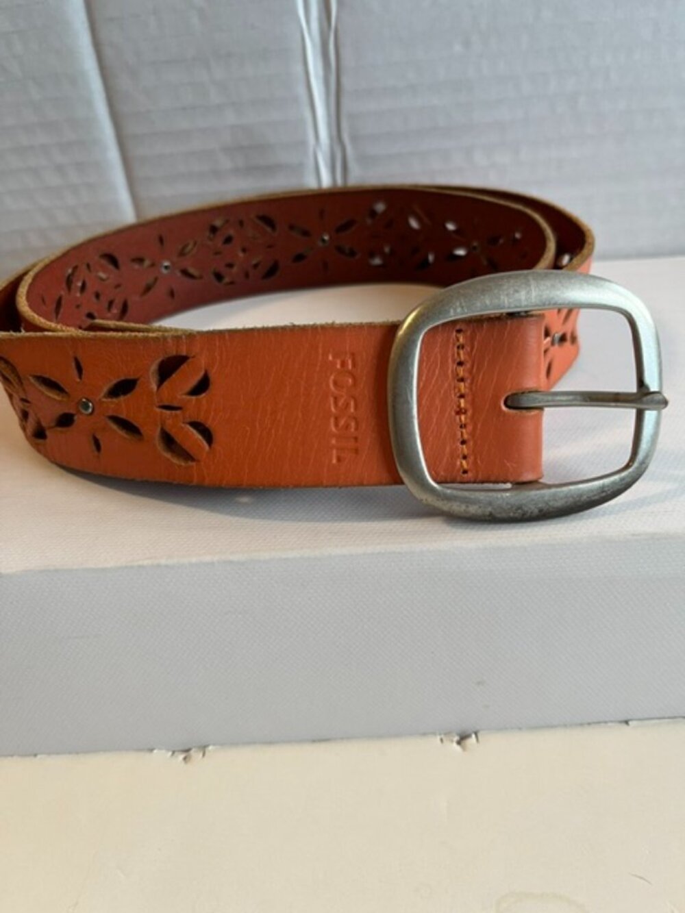 Fossil laser cut leather belt.